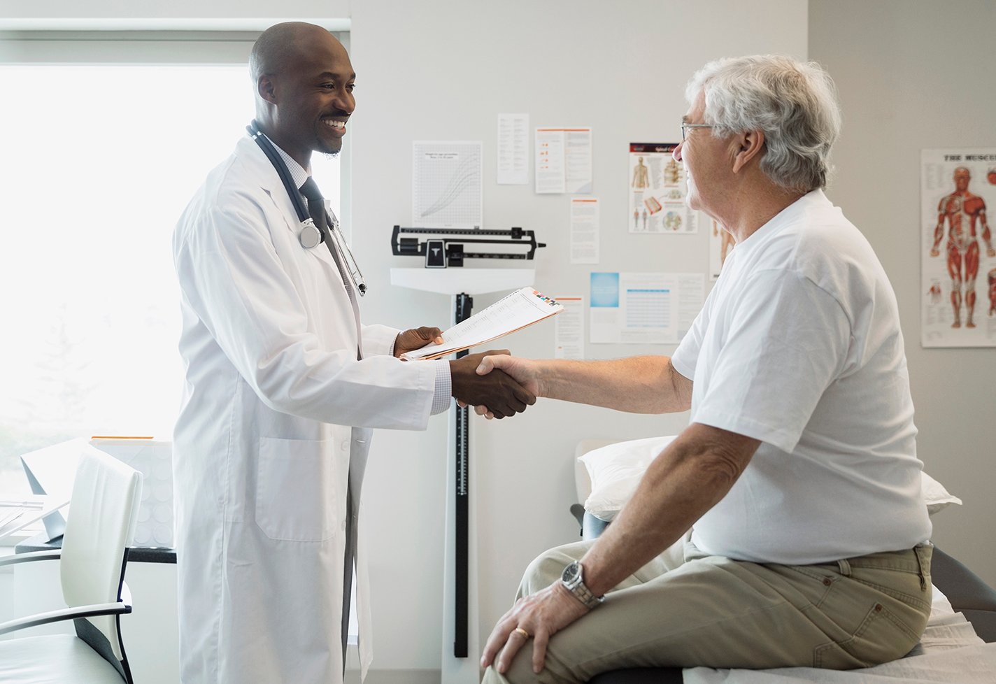 Physician greeting a new patient Physician greeting a new patient